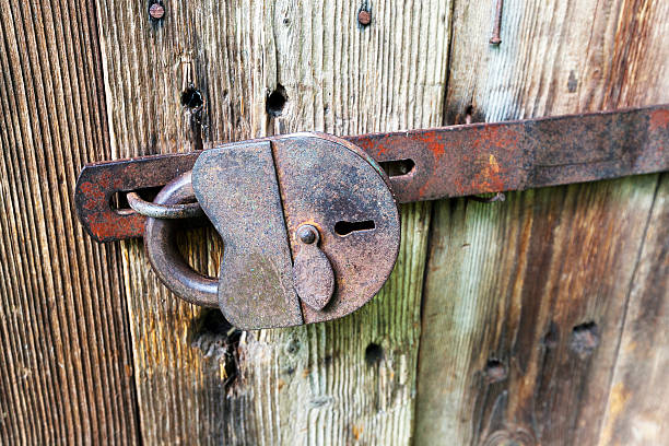 istock padlock .  wooden door 494833636