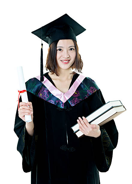istock Female graduate holding books 494833764