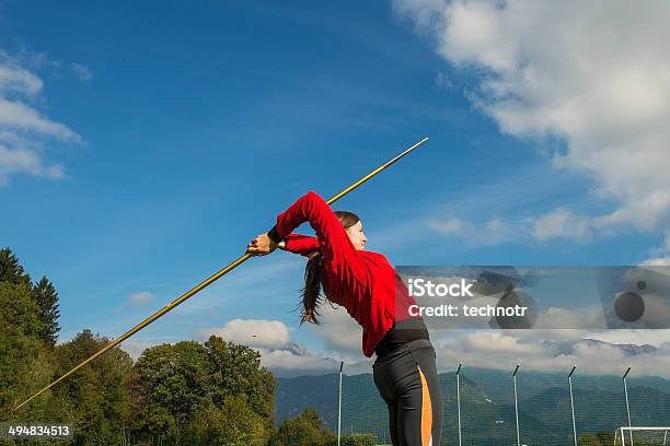 Side View Of Young Women Practicing Javelin Throw Stock Photo - Download Image Now - Accuracy, Active Lifestyle, Activity