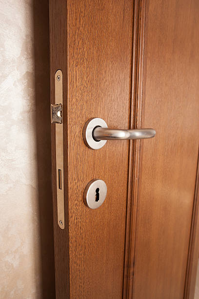 istock Door knob on a wooden door 494836175