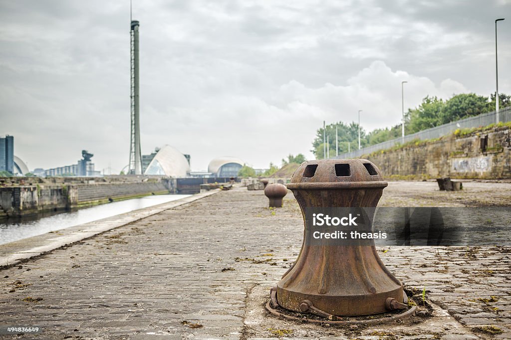 Govan Graving Docks, Glasgow Govan's derelict graving docks on the River Clyde in Glasgow. In the background is the Science Tower and Glasgow's Science Centre. Capstan Stock Photo