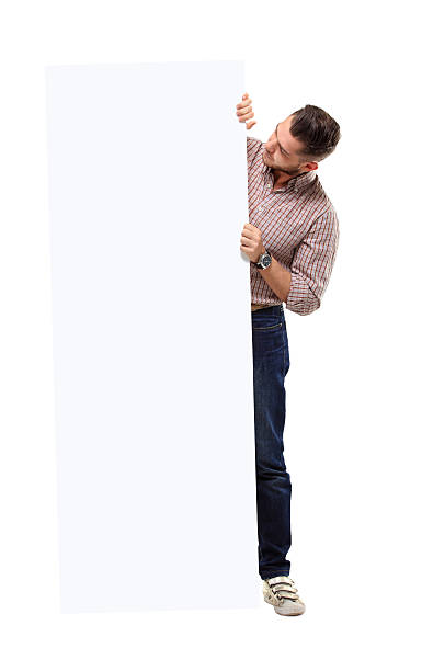 istock Happy business man presenting with copy space for your text 494836705