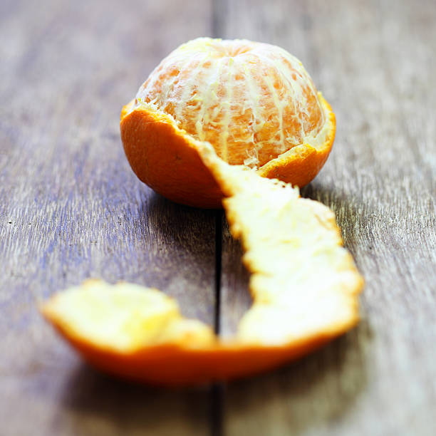 istock Tangerine, Mandarin honey orange on wood table 494837437