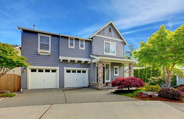 istock Grey American house with two garage doors. 494838065