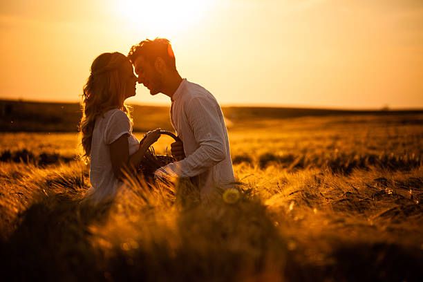 Loving couple in wheat field