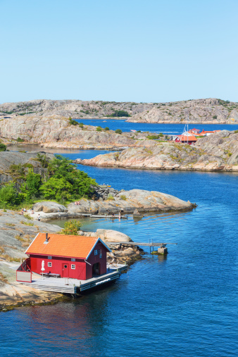 red houses in the harbor of Källö-Knippla island, northern archipelago (Schärengärten) off Gothenburg, Sweden