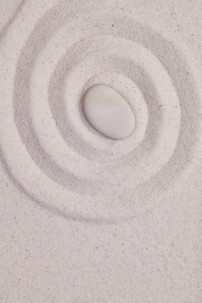 istock Spiral in the white sand  with white pebble 494850010