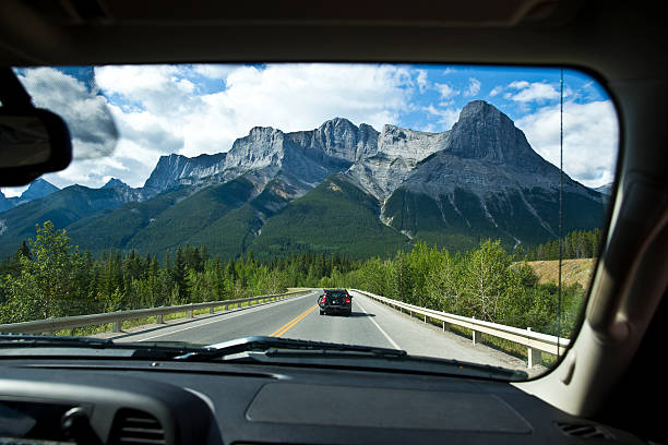 rocky mountain road trip - drive blue outdoors rear view zdjęcia i obrazy z banku zdjęć