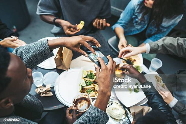 Friends In New York At Food Cart Stock Photo - Download Image Now - Food, Restaurant, Taco