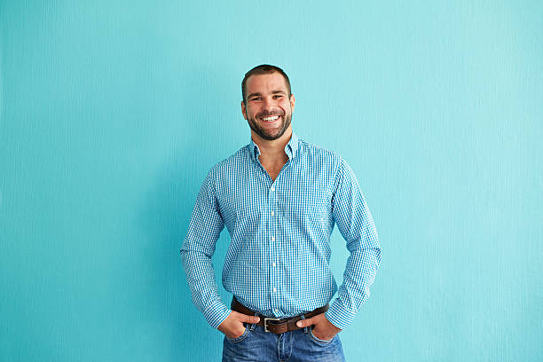 istock Man standing in front of wall 494854664