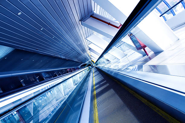 istock Moving escalator in the office hall 494854757
