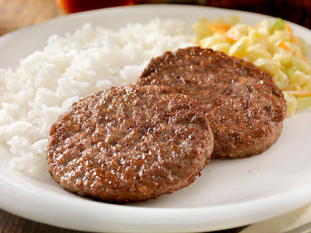 Hamburger Patties 2 Beef Patties with Rice and Macaroni Salad -Photographed on Hasselblad H3D2-39mb Camera salisbury steak stock pictures, royalty-free photos & images