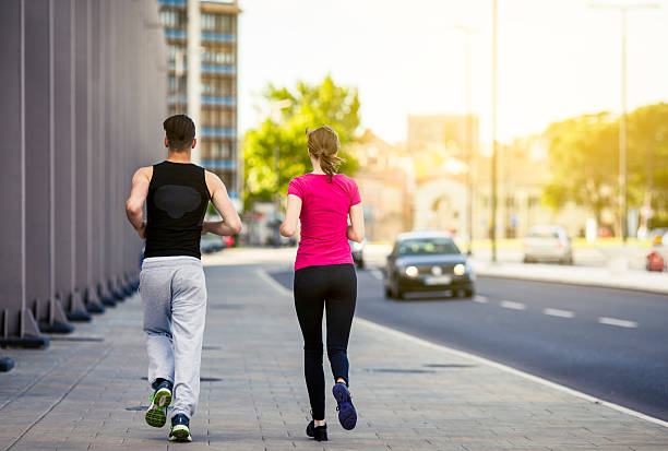 istock Couple jogging in the city 494854843