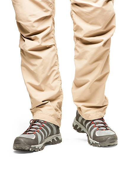 istock Hiker's legs in move at white background 494855244