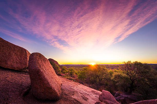 Sunrise Over Enchanted Rock State Park, TX Stunning autumn sunrise in the Texas Hill Country state park stock pictures, royalty-free photos & images