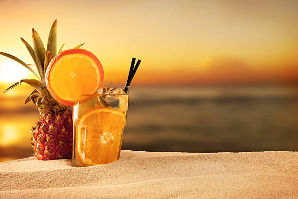 istock Summer drink with blur beach on background 494856369