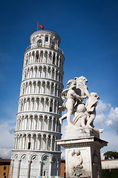 istock Leaning tower of Pisa with cherub statue in the foreground 494856643