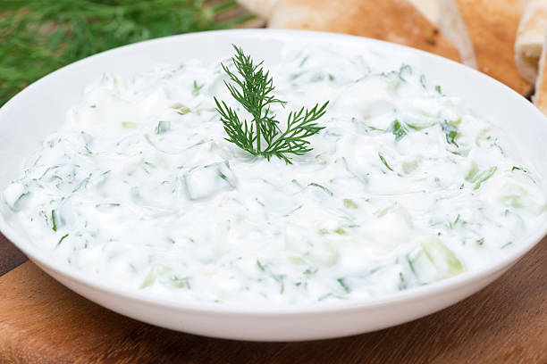 istock yoghurt sauce tzatziki with herbs, cucumber and garlic 494856671