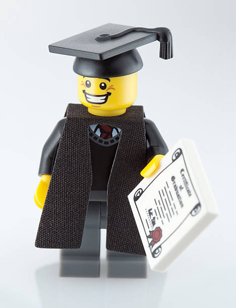 lego minifigure: выпускник - certificated стоковые фото и изображения