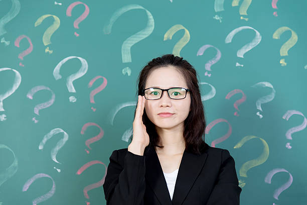 istock Businesswoman with question marks 494878248