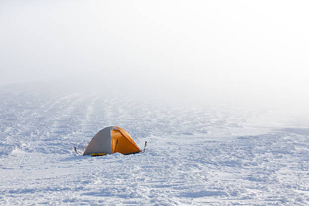 Camping during winter hiking in Carpathian mountains