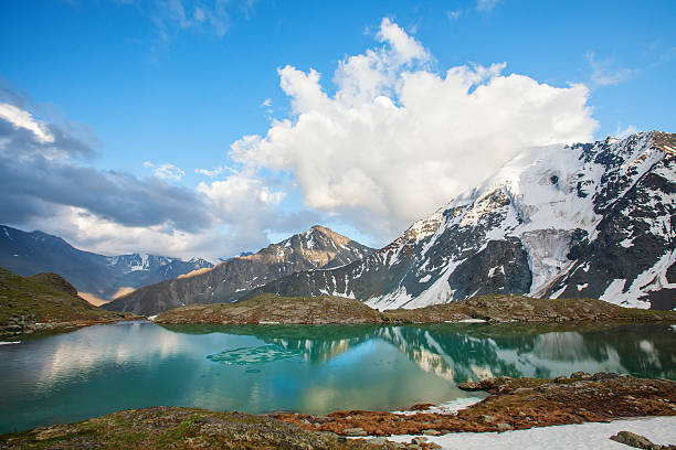 istock Beautiful mountain lake with reflection of nearest mountains 494879610