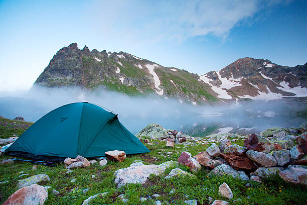 istock Green tent in the mountains 494879990