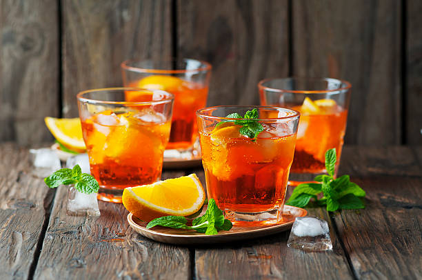 istock Glass of aperol with ice, orange and mint 494880754