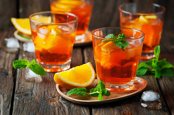 istock Glass of aperol with ice, orange and mint 494880794
