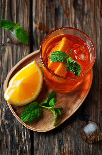 istock Glass of aperol with ice, orange and mint 494880832
