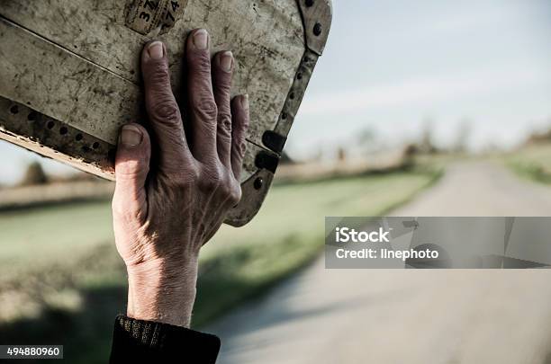 Refugee Woman Goes On The Road With Her Suitcase Stock Photo - Download Image Now - Refugee, Suitcase, Walking