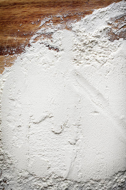 istock layer of flour on a cutting board 494891161