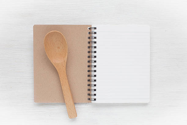 istock Empty notebook and kitchen utensils for food recipes 494891358