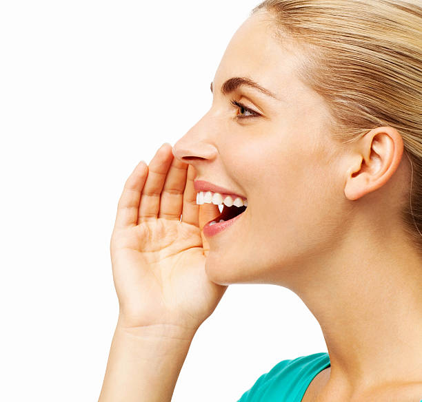 istock Young Woman Whispering A Secret 494891757