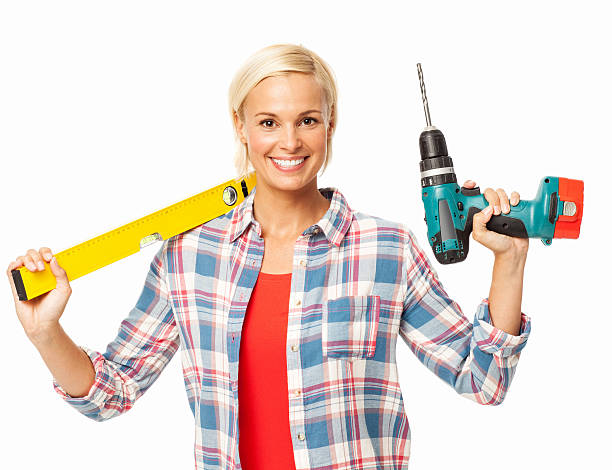 istock Carpenter Holding Drill Machine And Spirit Level 494891771