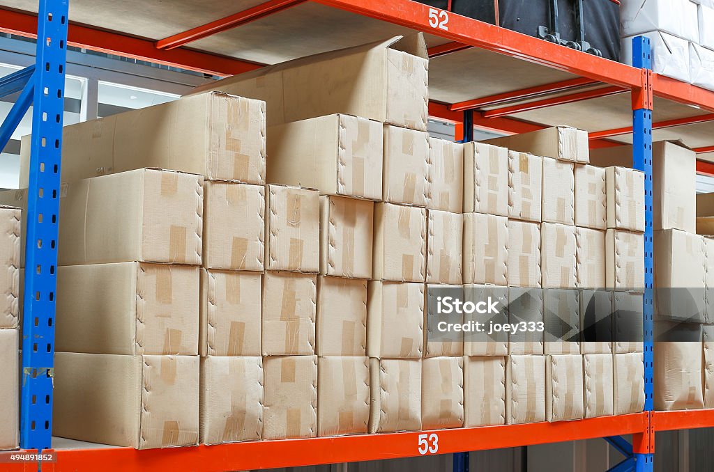cargo warehouse brown box parcel  on shelf in warehouse 2015 Stock Photo