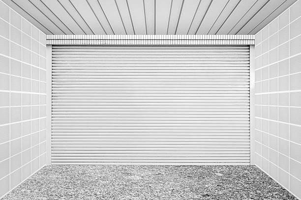 istock White metal roll shutter door at home garage 494892324