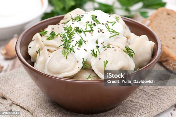 Traditional Russian Dumplings With Sour Cream Closeup Stock Photo - Download Image Now