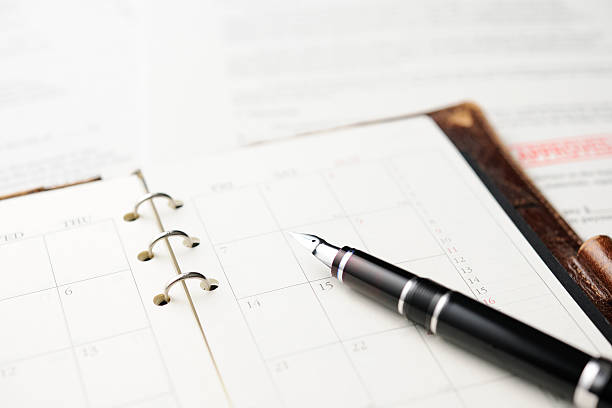 Closeup of notebook with to do list and pen. Case planning concept