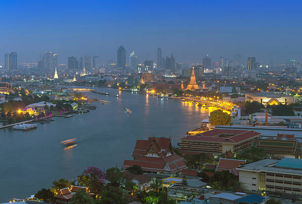 istock Bangkok cityscape river side at twilight can see wat arun 494893529