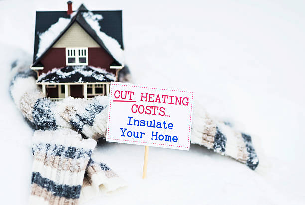 Cut Heating Costs. Insulate Your Home Cut Heating Costs. Insulate Your Home winterizing stock pictures, royalty-free photos & images