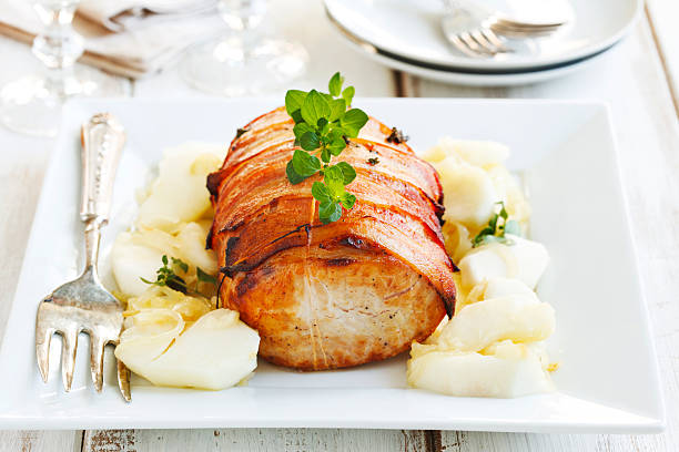 istock Bacon-Wrapped Pork Loin with Apples and Onion 494895002