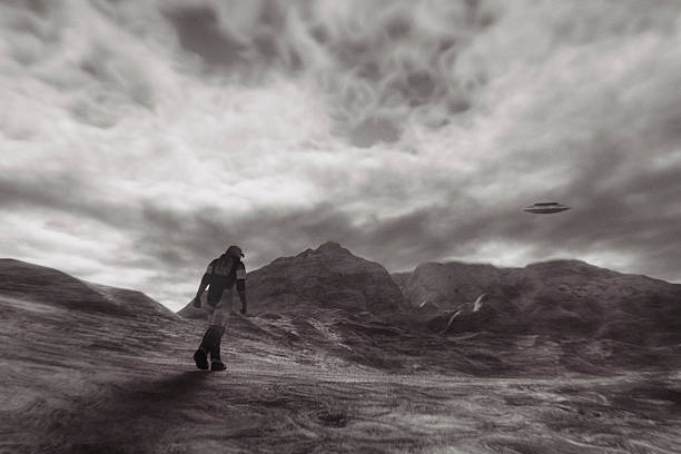 istock Astronaut walking on Mars, flying UFO 494896084