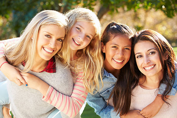 istock Portrait Of Two Mothers With Daughters 494896375