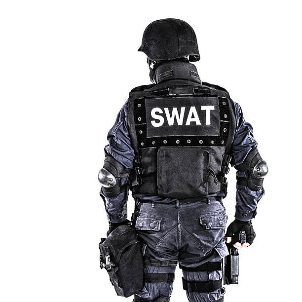 swat officer - spezialeinheit stock-fotos und bilder