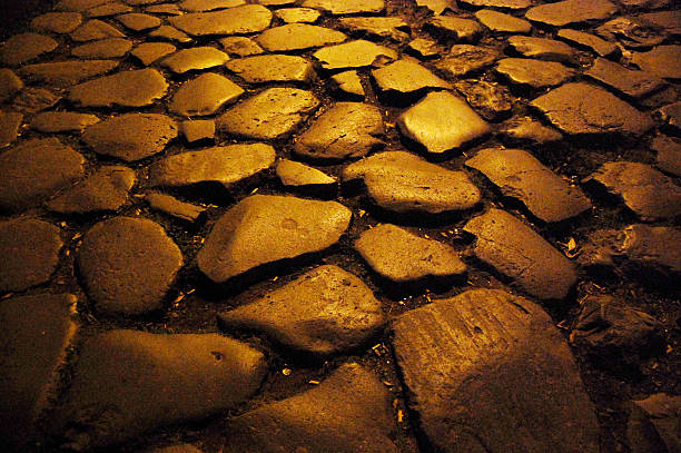istock Illuminated Golden Cobblestones of Roma 494897769