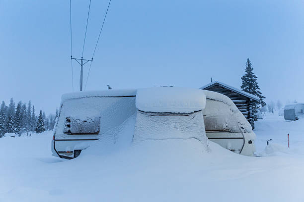 istock mobile caravan camper buried in winter snow 494897831