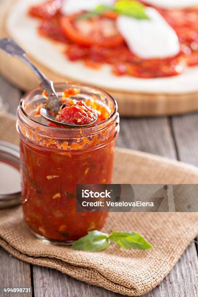 Pizza Sauce In A Jar Selective Focus Stock Photo - Download Image Now - Backgrounds, Basil, Black Color