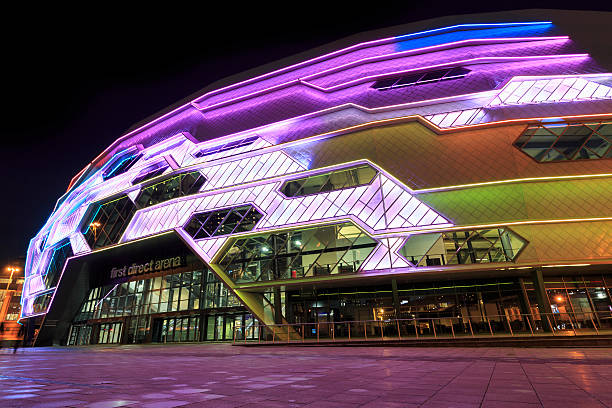 Leeds Arena exterior lit up at night stock photo