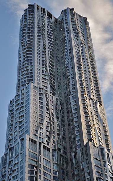 8 Spruce Street/Beekman Tower in Manhattan New York City, USA - October 13, 2015: The skyscraper known as 8 Spruce Street (originally known as Beekman Tower) designed by Frank Gehry in downtown Manhattan. frank gehry building stock pictures, royalty-free photos & images
